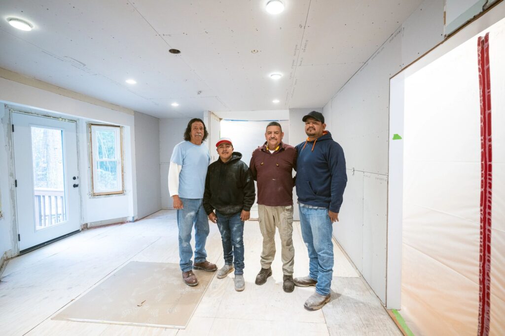 Construction workers team portrait - White Trillium Cleaners Construction workers team portrait